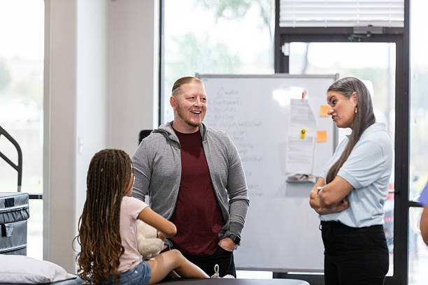 istock Family Therapy Session: Diverse Group Discussing Mental Health 2218958697