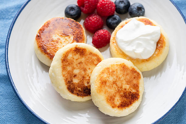istock Syrniki, curd cheese fritters closeup view 2218962861
