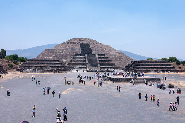 istock Teotihuacan archaeological site with pyramids, temples, and ruins surrounded by dry mountain landscape. 2218964954