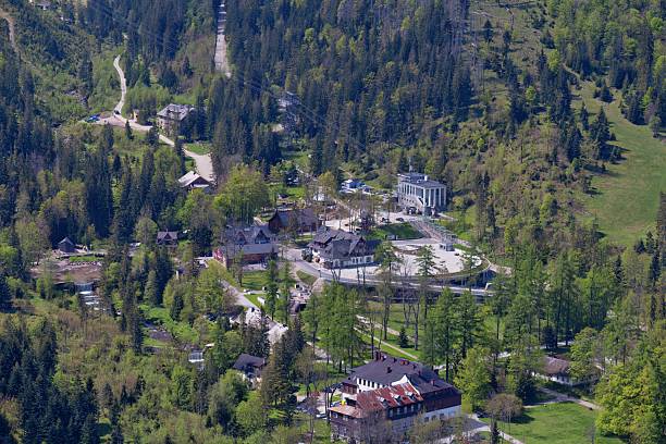 istock A high-angle shot captures a small village nestled amongst trees 2218965247