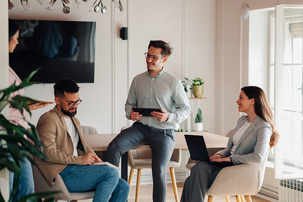 istock Business team collaborating on project in modern office 2218967298