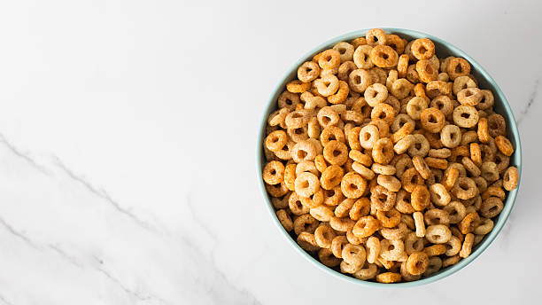 istock A bowl of round crispy cereal with milk. Healthy breakfast. Copy space 2218969529