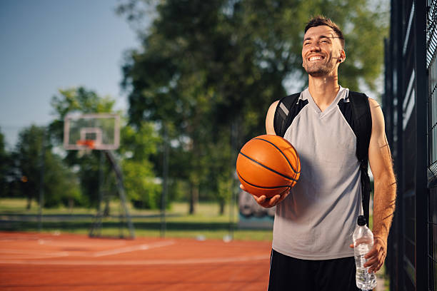 istock Basketball player smiling after training outdoors 2218970848