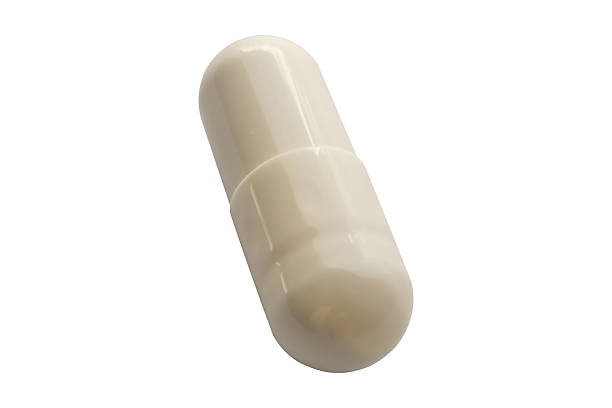 istock White medicine pill capsule isolated on white background 2218978797