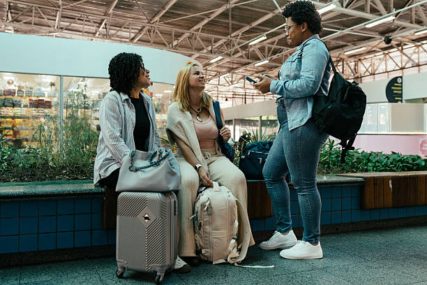 istock Women at the bus station going for a trip 2218981820