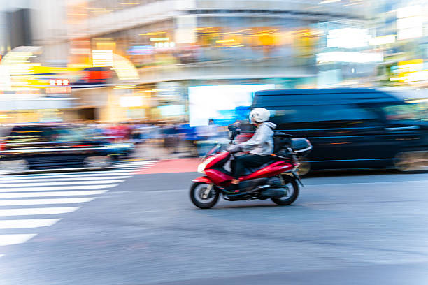 Red Scooter Delivery in Shibuya Rush