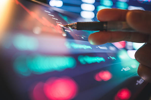 istock Business advisors using digital gadget to tracking financial goals with artificial intelligence and chatbot to track financial goals and investment performance. Suitable for themes of personal finance and financial planning 2025 2218988114