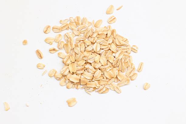 istock Top view of oatmeal on white background 2218990065