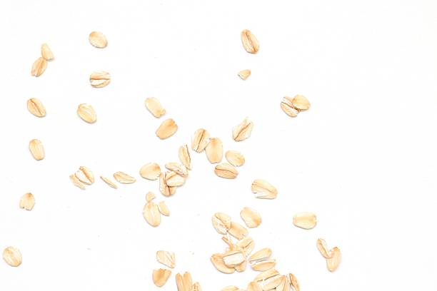 Top view of oatmeal food on white background, oat grains food