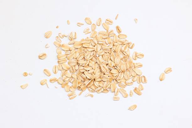 istock Top view of oatmeal on white background 2218990078