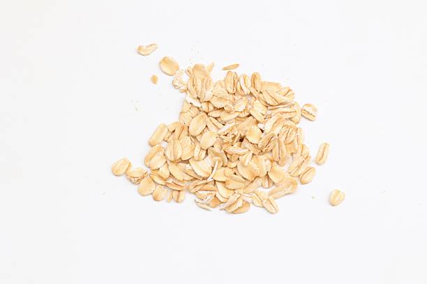 istock Top view of oatmeal on white background 2218990080