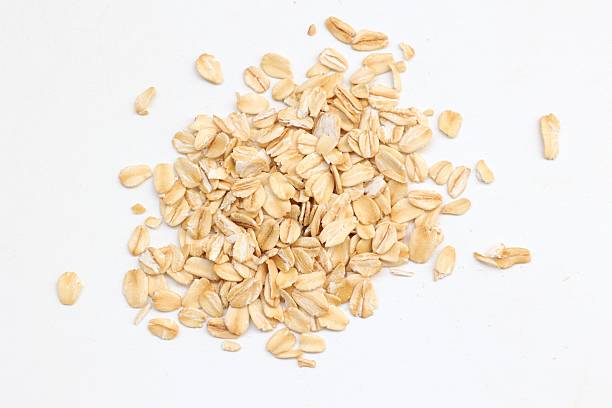 istock Top view of oatmeal on white background 2218990085