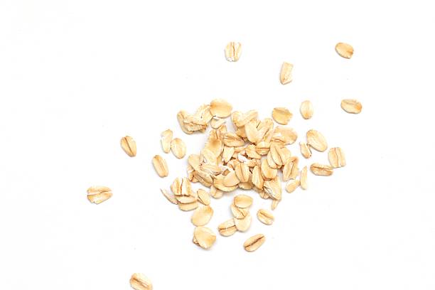 istock Top view of oatmeal on white background 2218990102