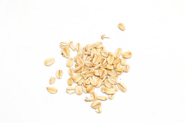 istock Top view of oatmeal on white background 2218990103