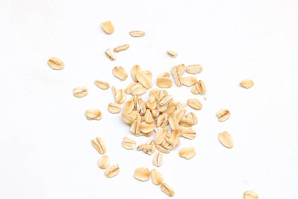 istock Top view of oatmeal on white background 2218990112