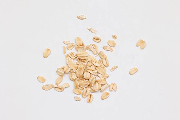 istock Top view of oatmeal on white background 2218990116