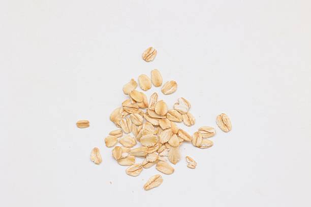 istock Top view of oatmeal on white background 2218990122