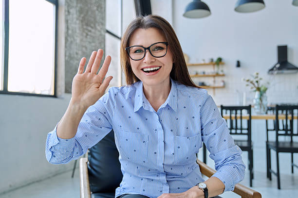 istock Webcam view of middle aged woman having video conference, chat 2218993351