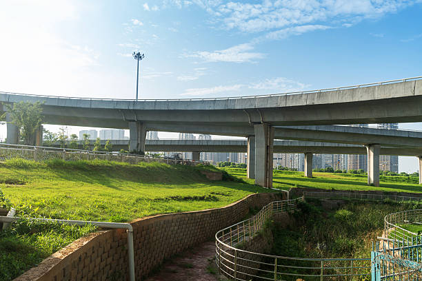 istock Concrete structure and asphalt road space under the overpass in the city 2219001900