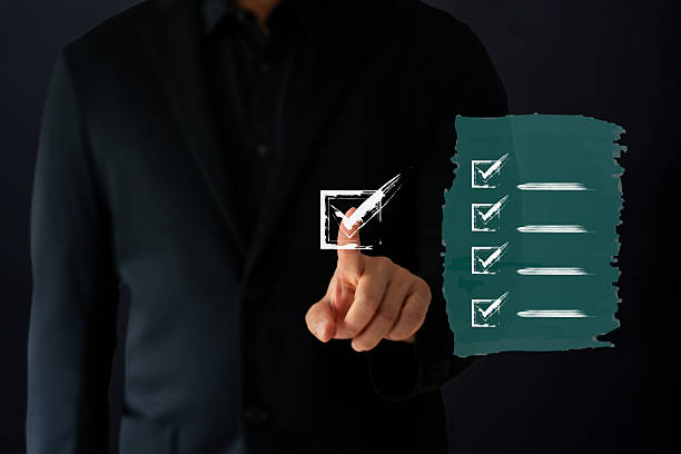 istock A Business are selecting check mark which floating and drawing by paint brush 2219007697