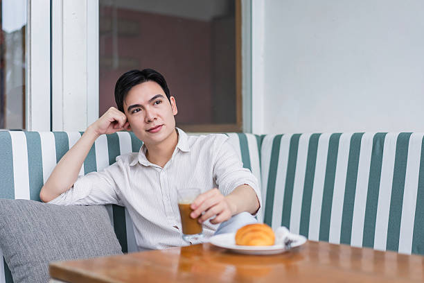 istock Relaxing afternoon with coffee and pastry in a cozy cafe setting 2219011857
