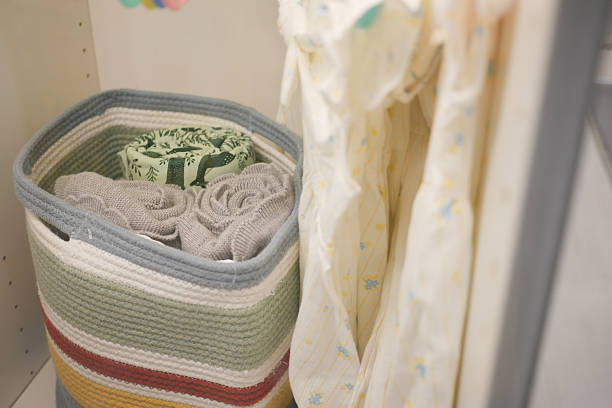 istock Organized storage with rolled towels and fabric in a neat basket 2219015508