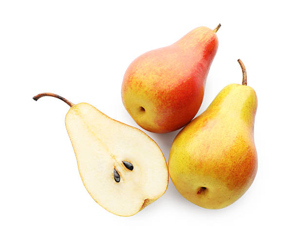 istock Whole and cut ripe pears isolated on white, top view 2219020598