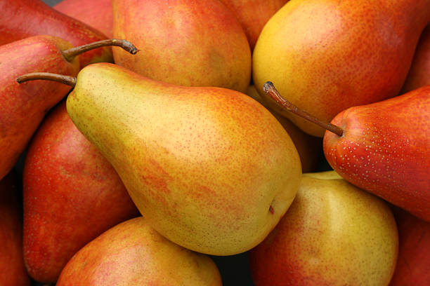 Fresh ripe juicy pears as background, closeup