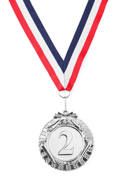 istock Silver medal with striped ribbon isolated on white, top view 2219021383