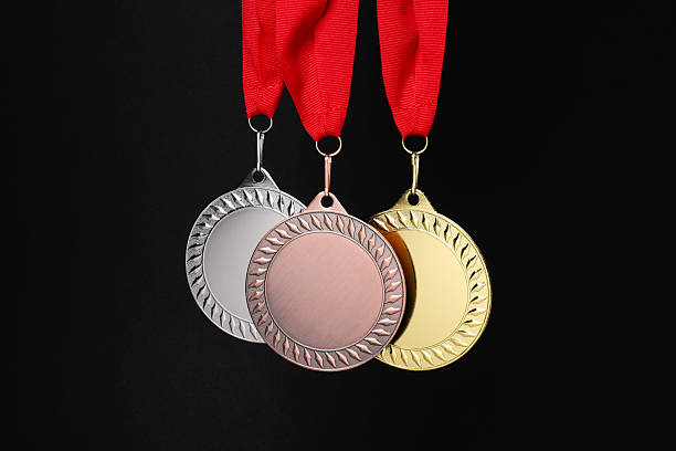 istock Golden, silver and bronze medals on black background 2219021426