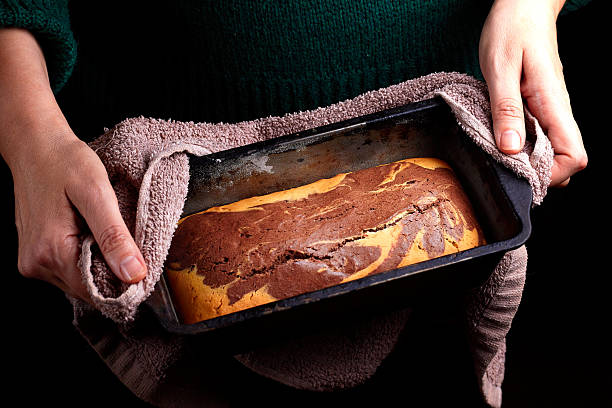 Baked cake in the form of women's hands