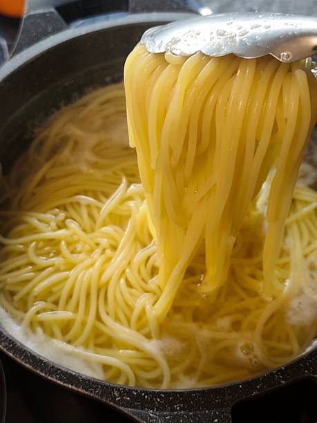 istock Preparation of spaghetti, boiling water 2219031502