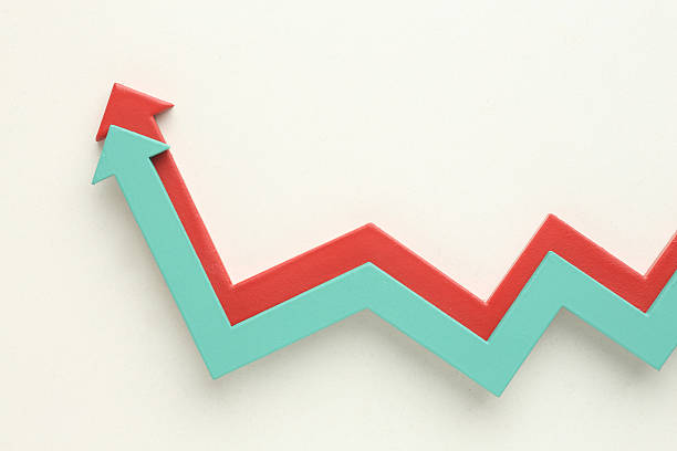 istock Multicoloured arrows pointing up and down. Symbolise growth progress, success in business finance. Rising bars of graphs represent market trends, return on investment, business development, financial graphs. 2219036469