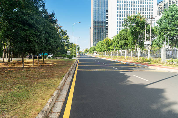 istock Empty urban road and buildings in the city 2219040251