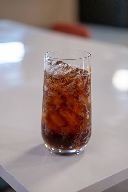 istock A glass of Cola on the table with bokeh background 2219046202