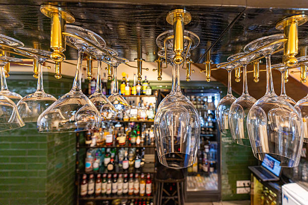 istock Hanging Glasses in a Bar with Bottles of 2219046698