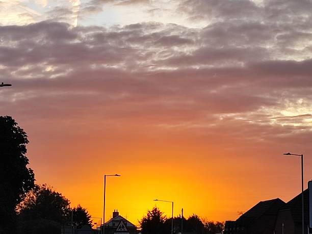 istock Dramatic Orange Sunset with silhouetted foreground, South Wales UK. 2219047736