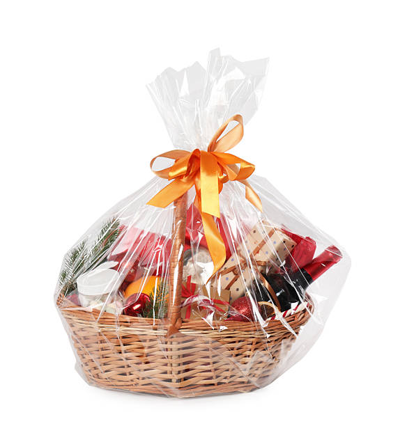 istock Wicker gift basket with sparkling wine isolated on white 2219048717