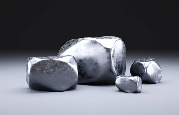 Metal ore pieces on gray background. 3d-rendering