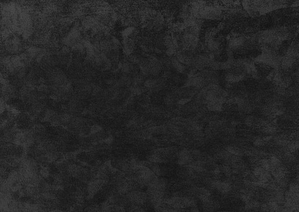 istock dark black crushed velvet texture close-up, soft luxurious fabric background for design. 2219062579