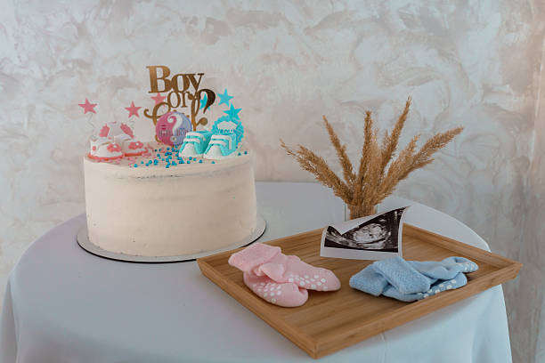 istock Celebratory Baby Shower Cake with Accessories 2219064303