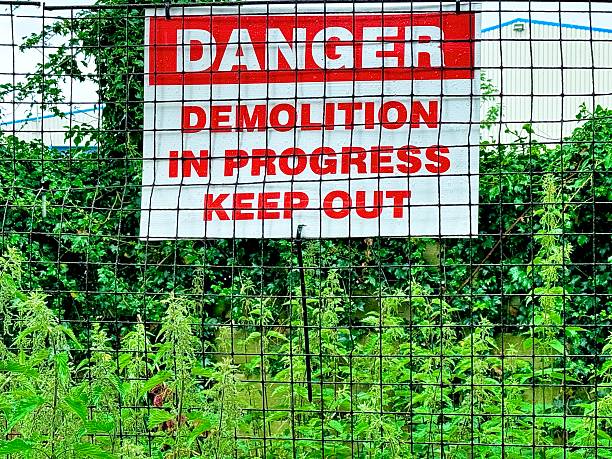 istock A danger warning sign next to a demolition site 2219065835