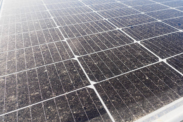 istock Dusty solar panels showcase need for regular maintenance and cleaning for optimal energy production 2219070492