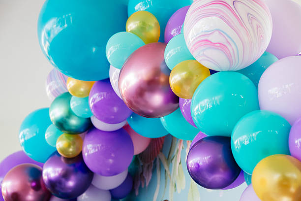 istock Colorful balloons hanging, creating a festive atmosphere for a party 2219075899