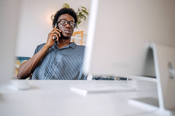istock Young adult at home surrounded with computers doing computer crime 2219078705