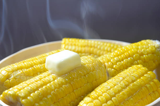 istock Cooking corn butter in a steamer with rising steam 2219089855