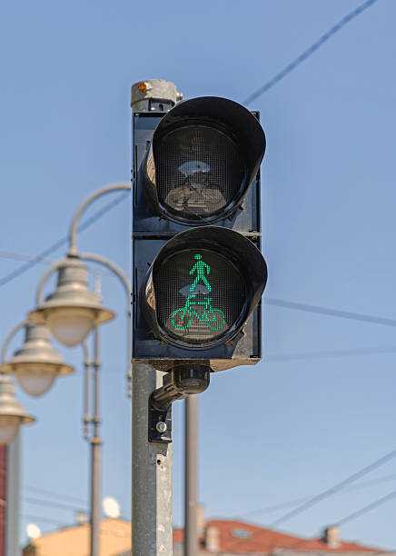istock Pedestrians Bicycle Traffic Light 2219092526