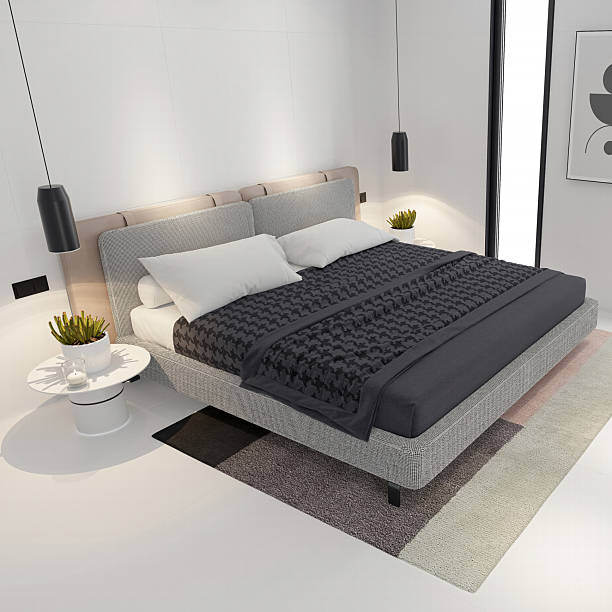 istock Minimalist Modern Bed in a Serene White Bedroom 2219095474
