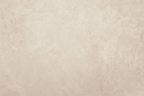 istock Colour old concrete wall texture background. Close up retro plain cream color cement wall background texture. Design paper vintage parchment element. 2219099979
