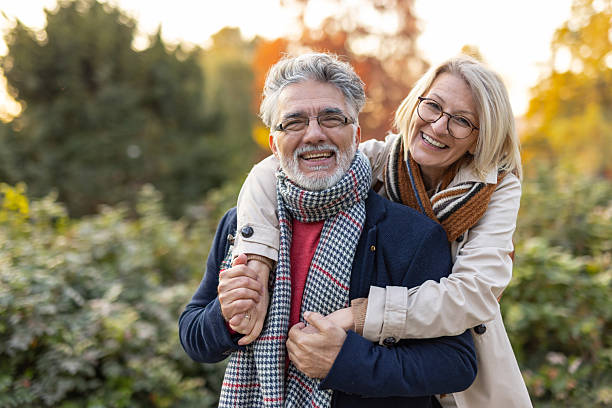 istock Couple basking in love during a scenic autumn setting 2219100169